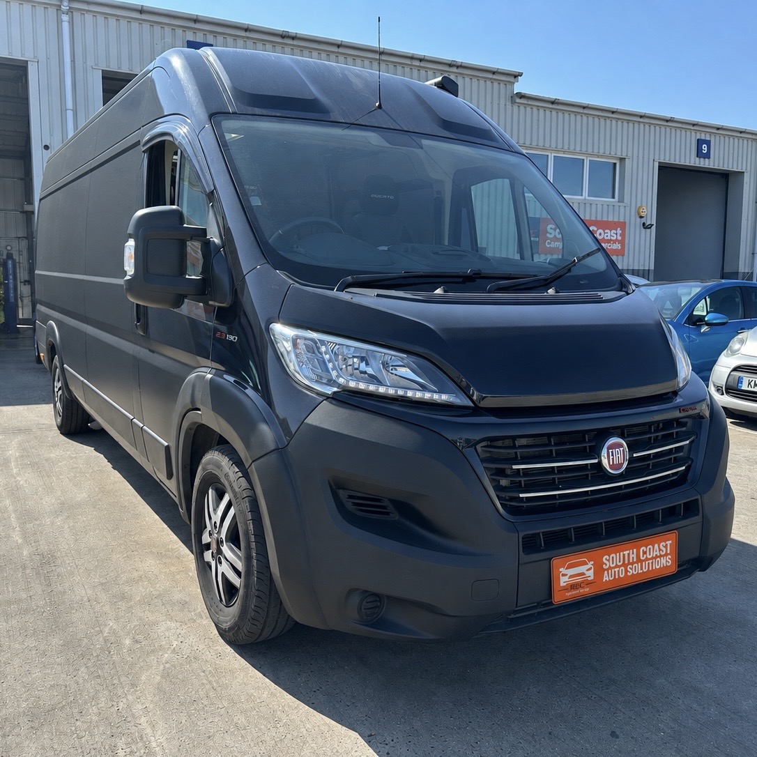 Black Fiat van for commercial vehicle servicing